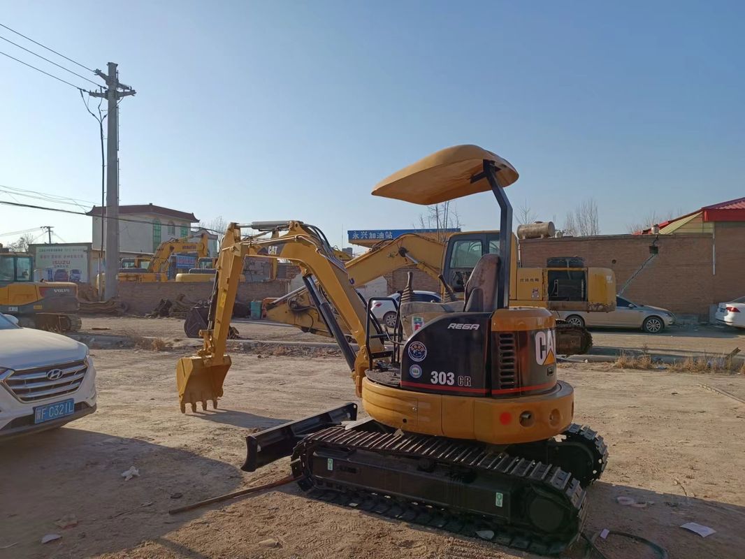 Digunakan excavator berjalan CAT303 tanpa mengemudi kabin mini excavator untuk dijual digunakan mini excavator penjualan